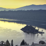 Emerald Bay Lake Tahoe forest  fire season smokey skies sunrise california